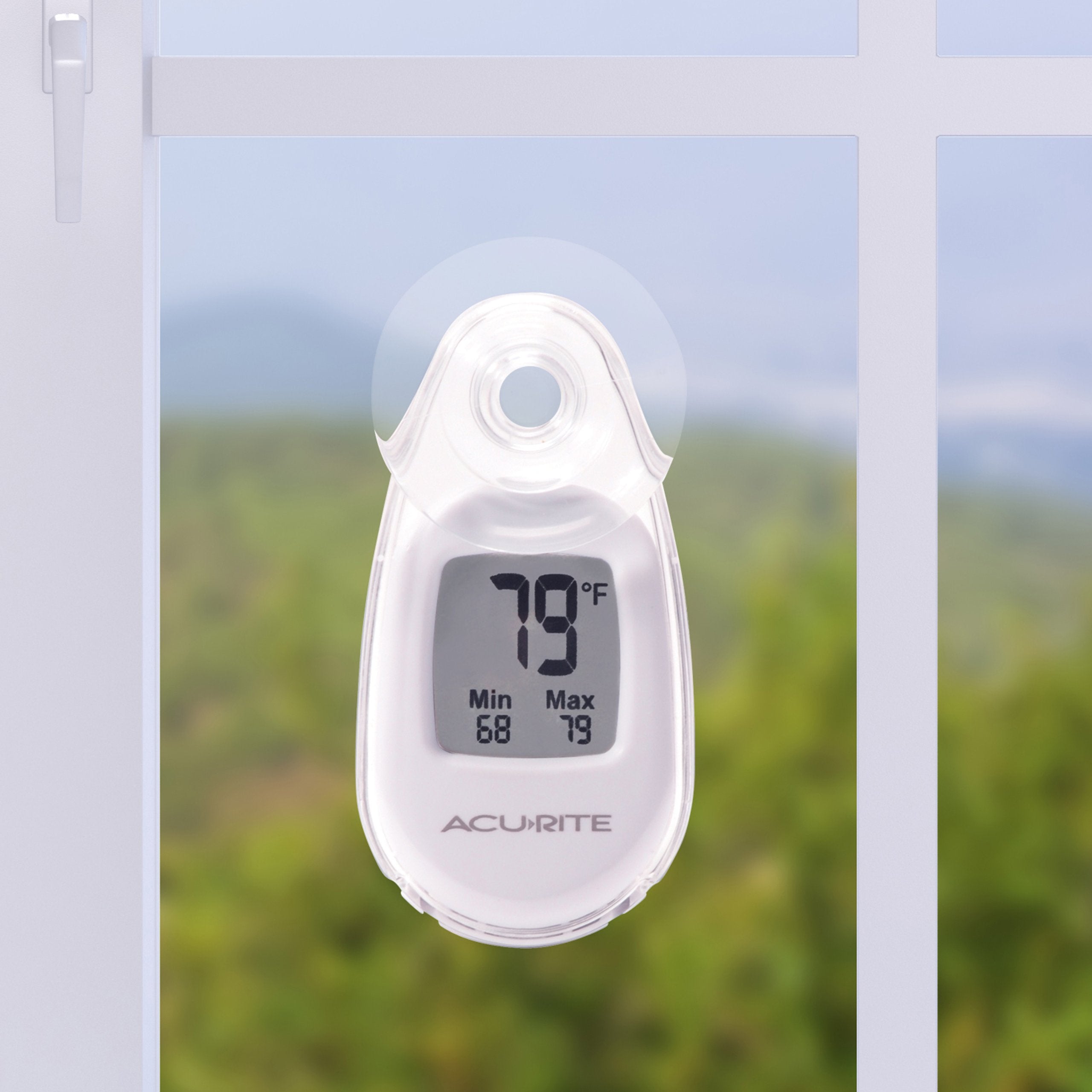 AcuRite thermometer with suction cup mounted for outdoor window use with reversible design