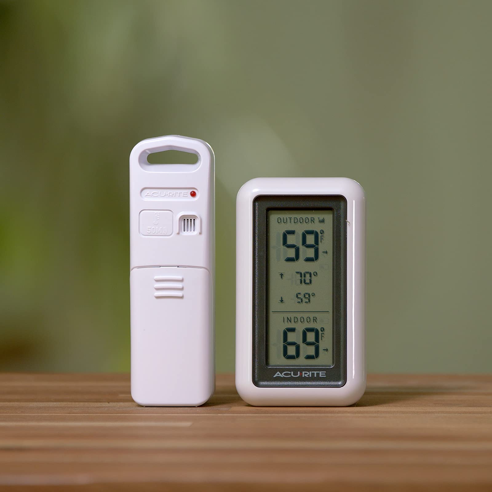 AcuRite thermometer with trend arrows indicating rising or falling temps