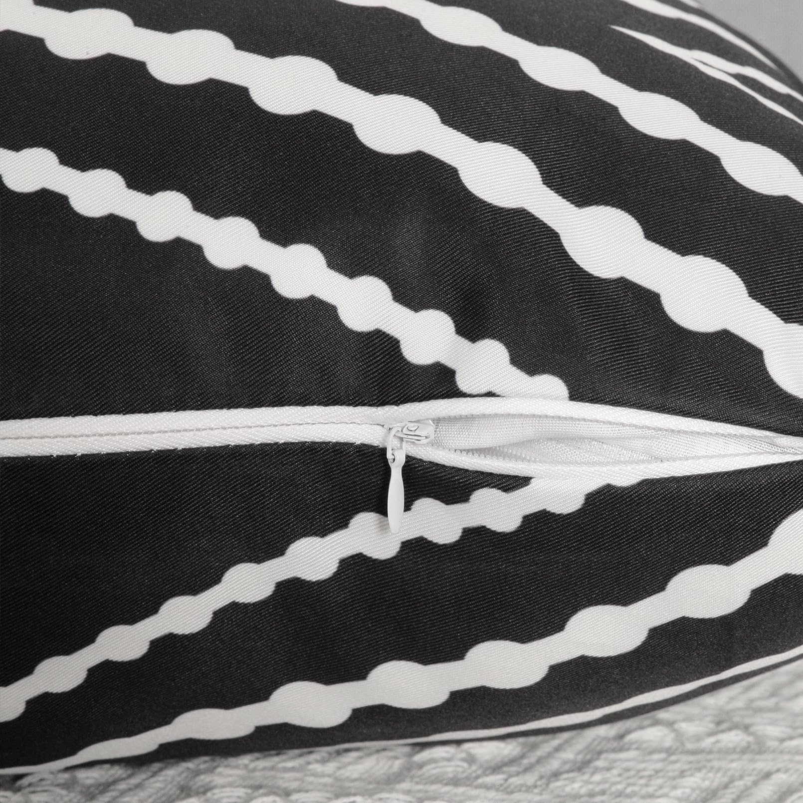 Adabana geometric pattern pillow cover adds modern charm to seating.
