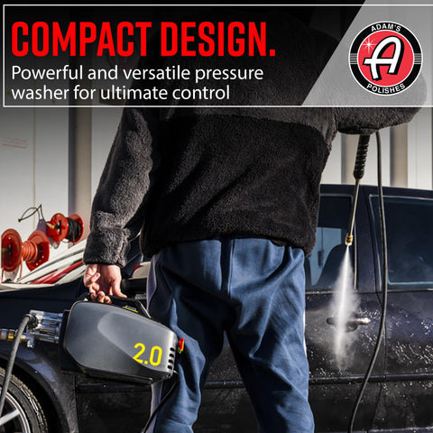 Adam's Polishes portable electric washer pump in action for quick outdoor cleaning.