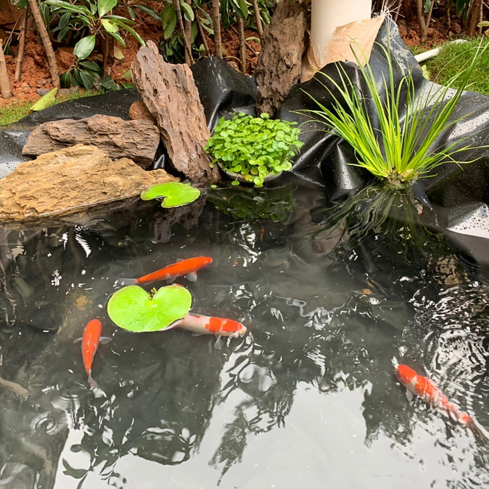 Adroiteet garden fountain liner setup highlighting seamless surface for water features.