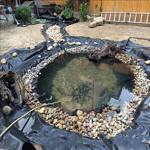 Adroiteet outdoor pond installation with flexible liner for varied shapes.