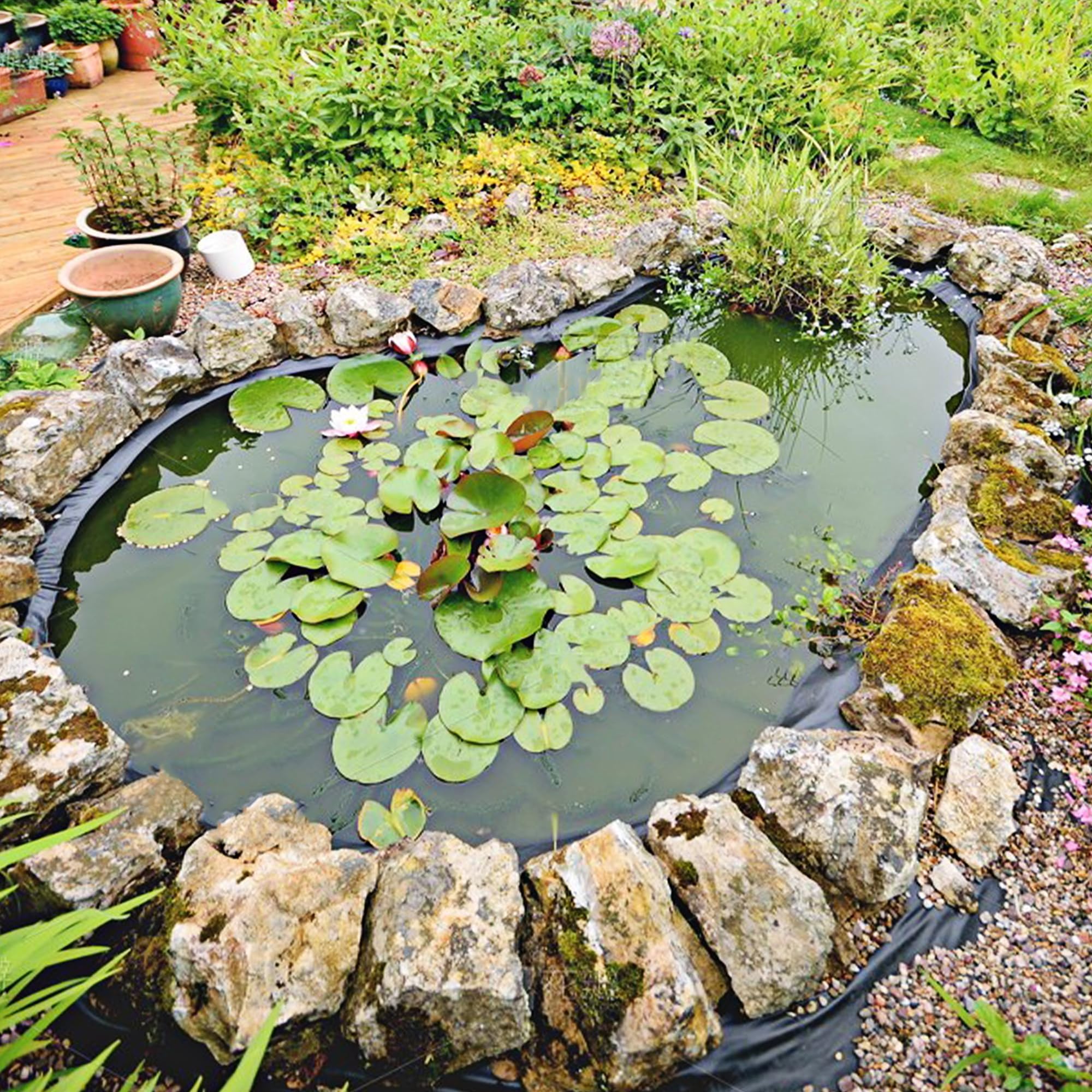 Adroiteet 20mil HDPE pond liner demonstrates strong puncture resistance for outdoor ponds.
