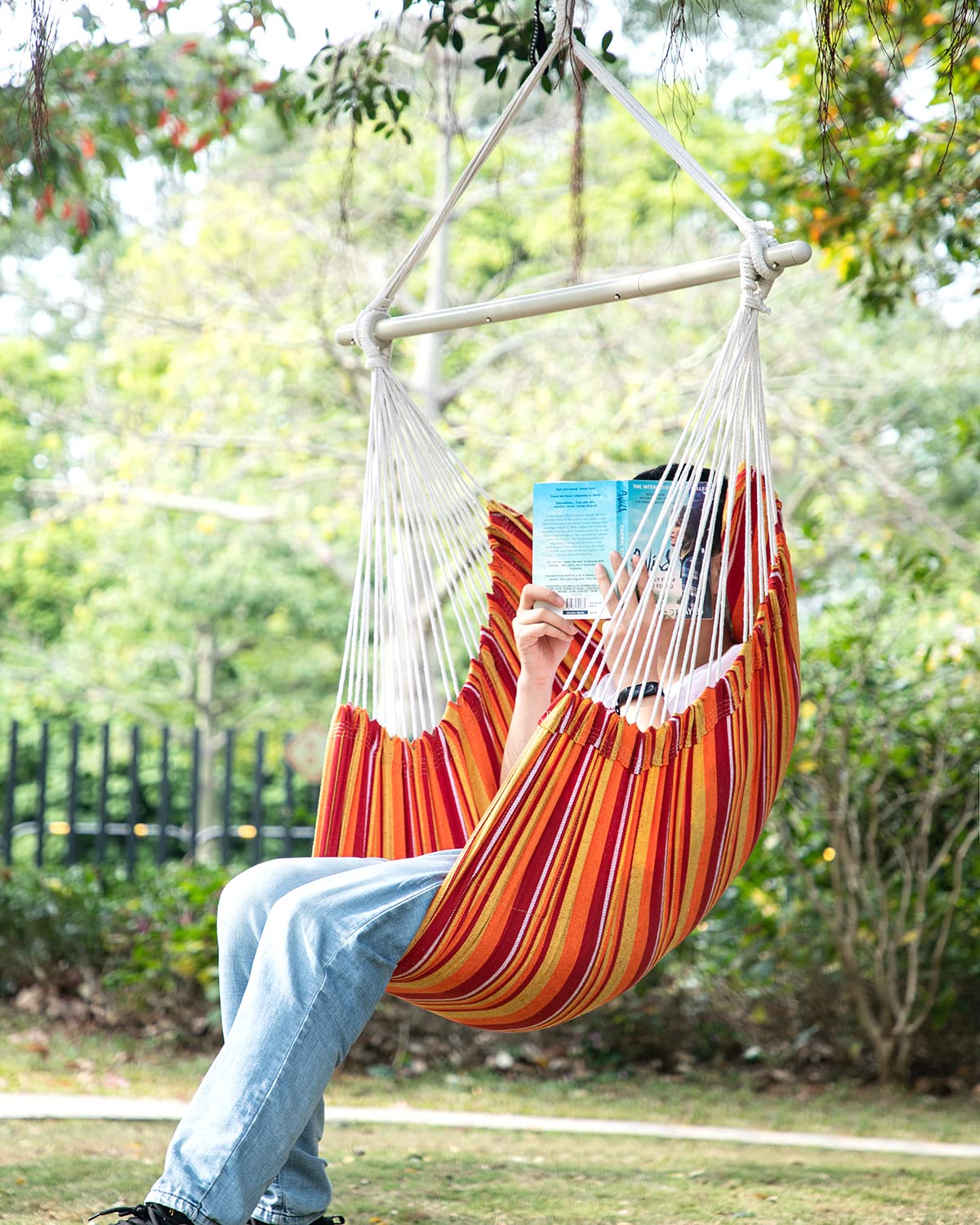 ADVOKAIR hammock chair side pocket in use for easy essentials within reach