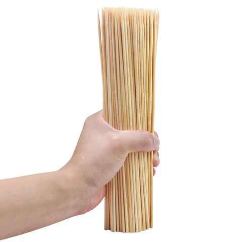 Aerisque 12-inch bamboo skewers ready for grill use, ideal for kebabs and grilled meats.