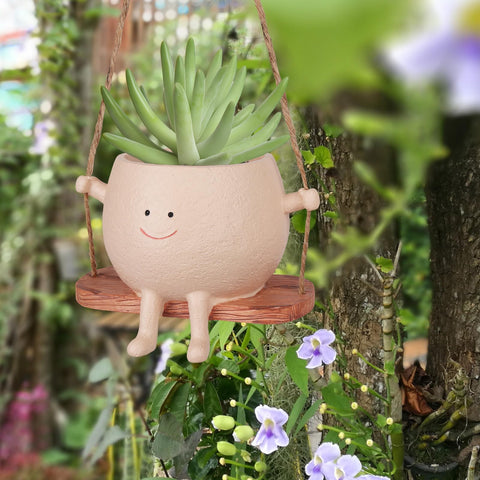 AFFLAT Cute Swinging Planter highlights playful motion on shelves or windowsills.
