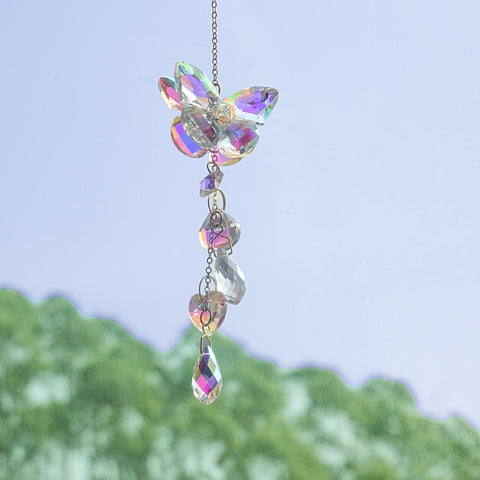 Afiaiwei car window suncatcher casts colorful rainbows on the road