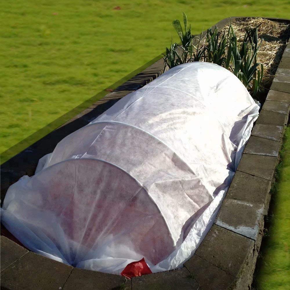 Agfabric snow and hail protection safeguards foliage during storms.