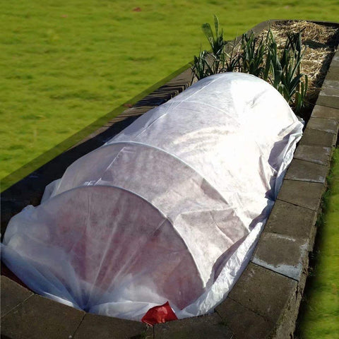 Agfabric snow and hail protection safeguards foliage during storms.