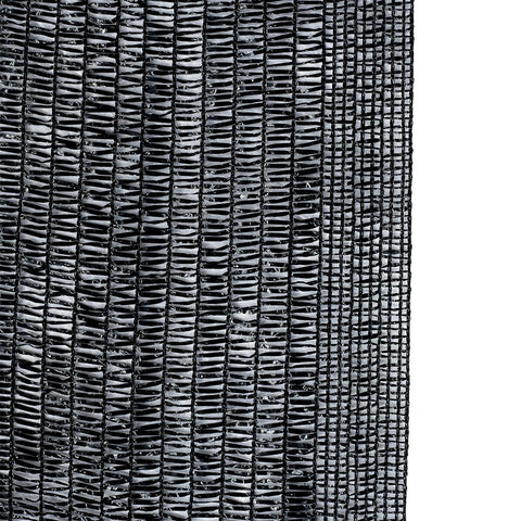 Agfabric Sun-Block shade cloth in garden-greenhouse setting cools plants while letting water through.