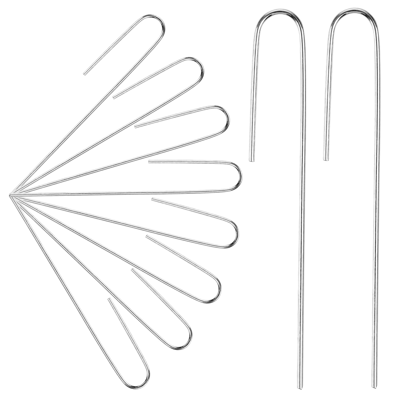 Agolctry 100pcs J-shaped drip stakes securing irrigation lines in outdoor beds.