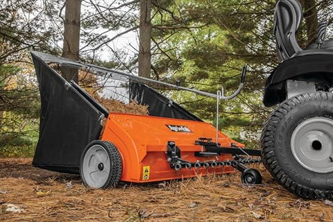 Agri-Fab front-mount lawn dethatcher attachment ready for quick sweeper hookup
