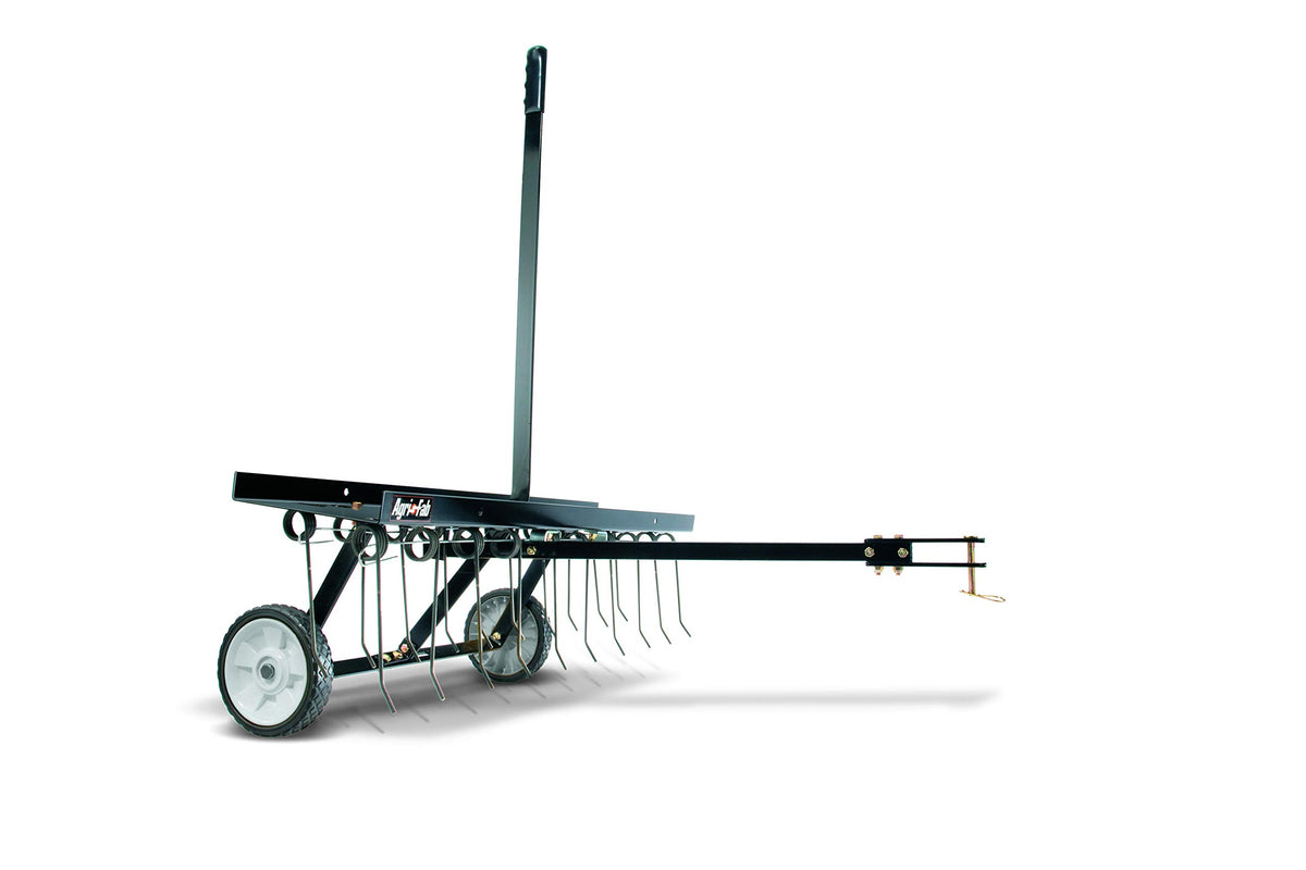 Agri-Fab 45-0294 tow-behind lawn dethatcher with 20 spring tines for efficient thatch removal.