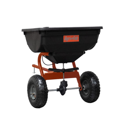 Agri-Fab 85 lb tow spreader with hopper for even lawn seeding