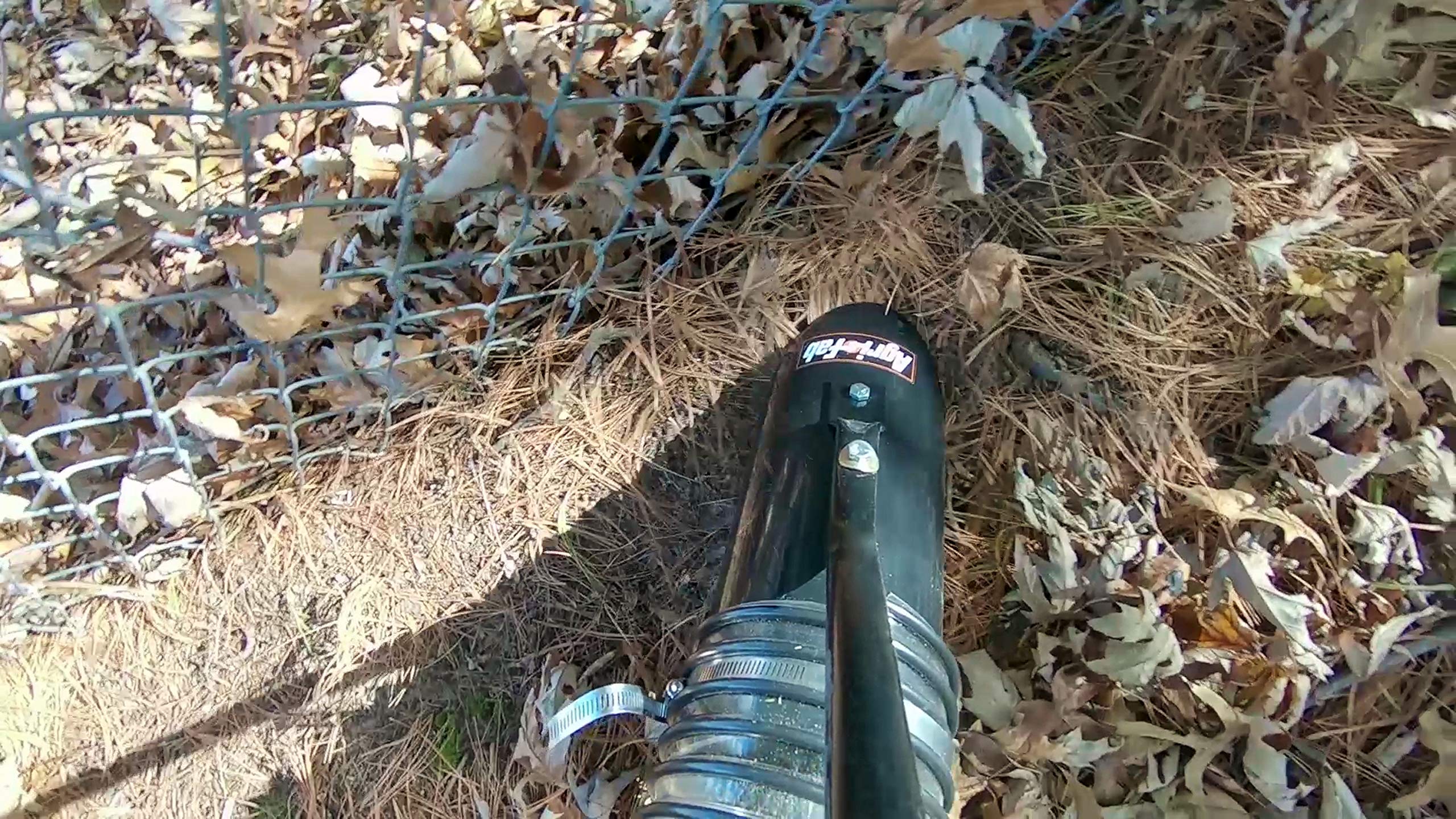 Agri-Fab hose kit helps reach around shrubs and beds.