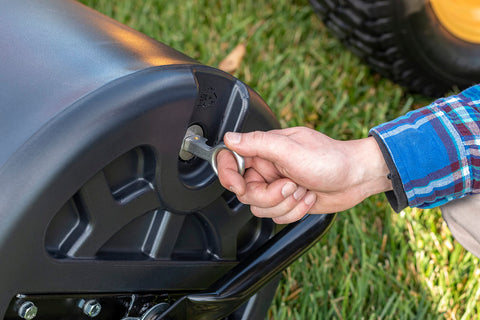 Agri-Fab surface leveling demonstration shows smooth soil after rolling.