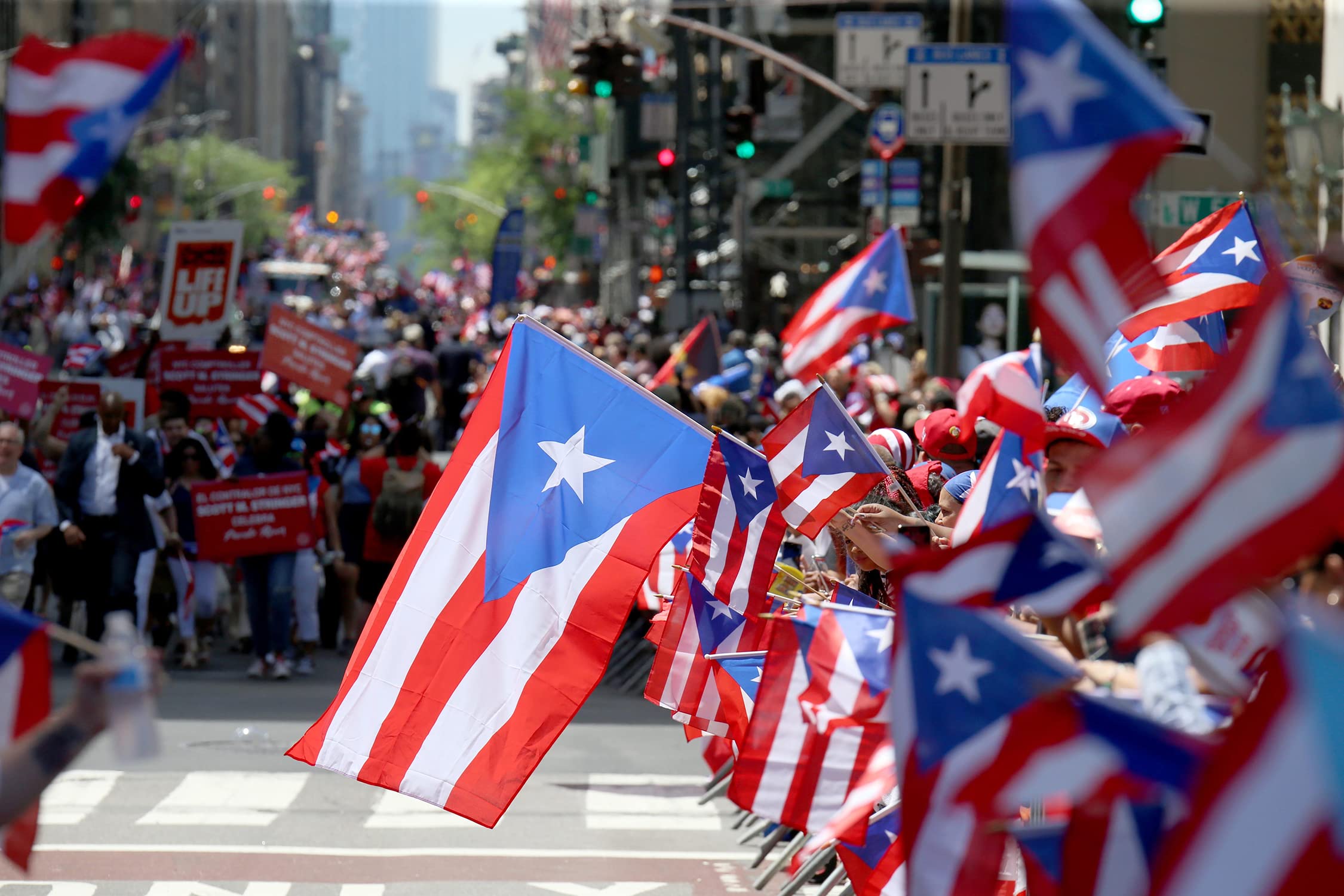 AGUIFLGS Puerto Rico flag displayed outdoors for pride and tribute