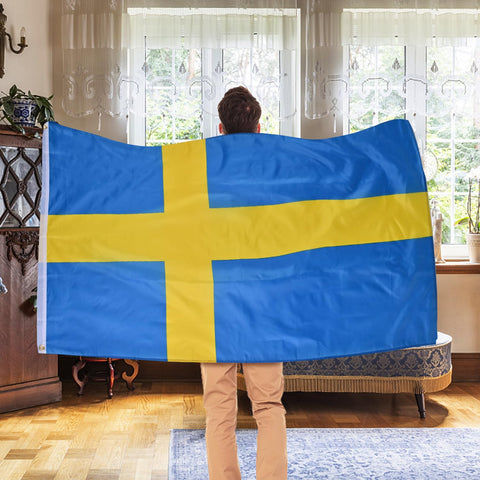AhfuLife Swedish flag displayed on a wall or dorm for patriotic decor.