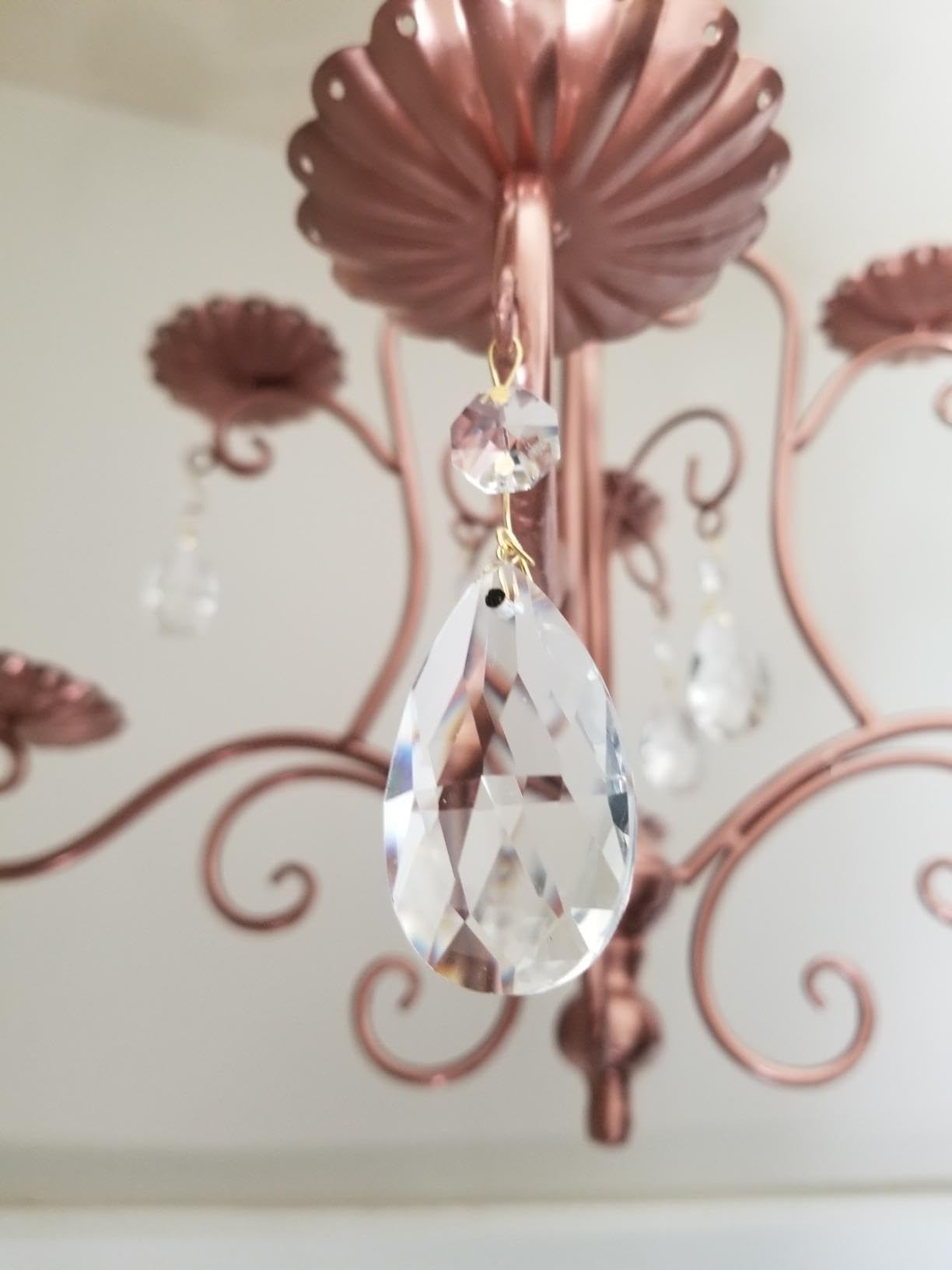 Aiskaer crystal pendant used as window decor catching sun