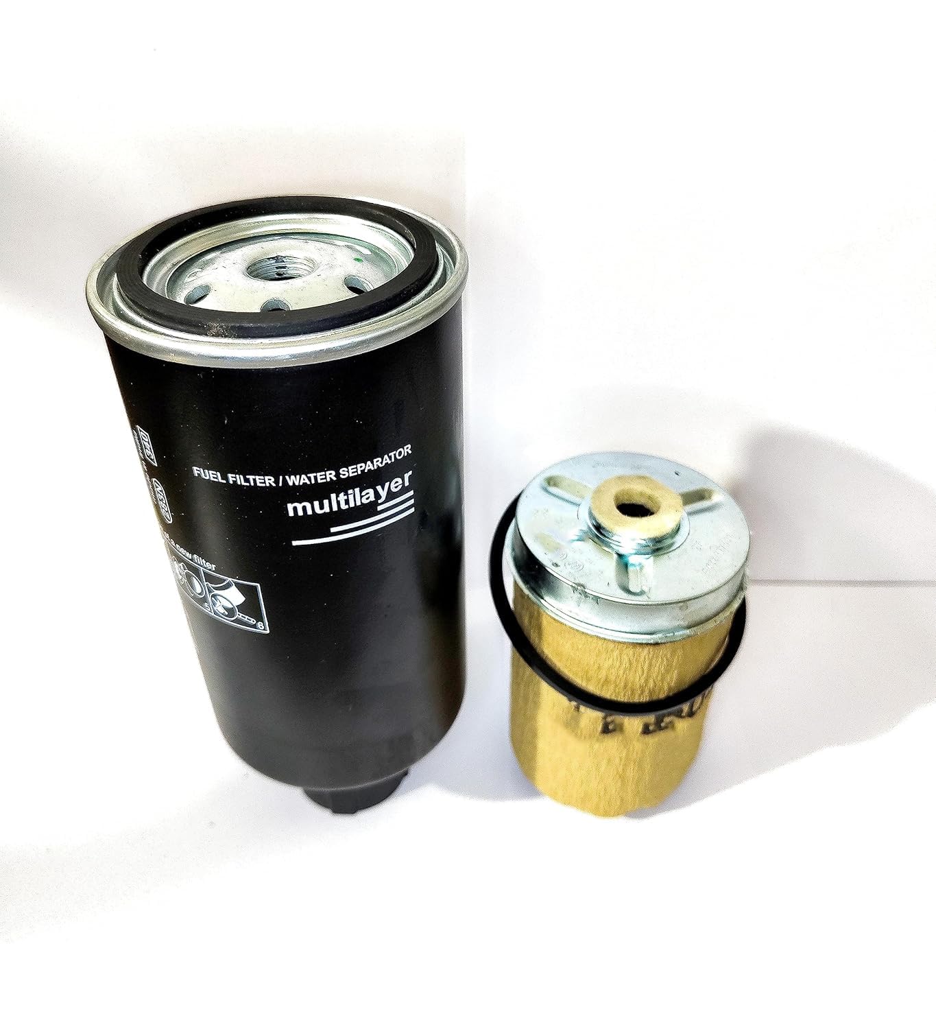 AJ Automotive fuel filter combo Mahindra installed on tractor view supports smooth operation.