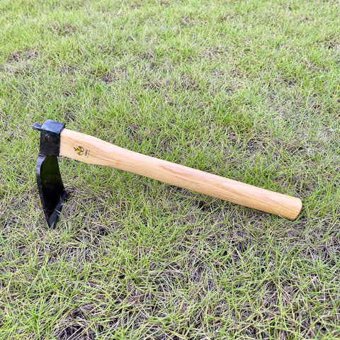 Alanx curved hoe in use for precise weeding and cultivation
