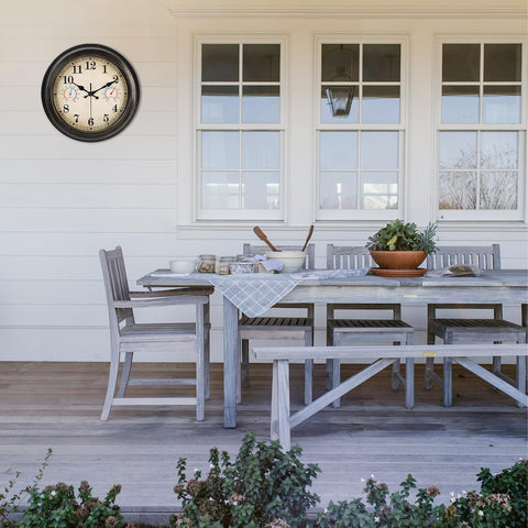 Alarllok outdoor clock thermometer-hygrometer readings help monitor conditions.