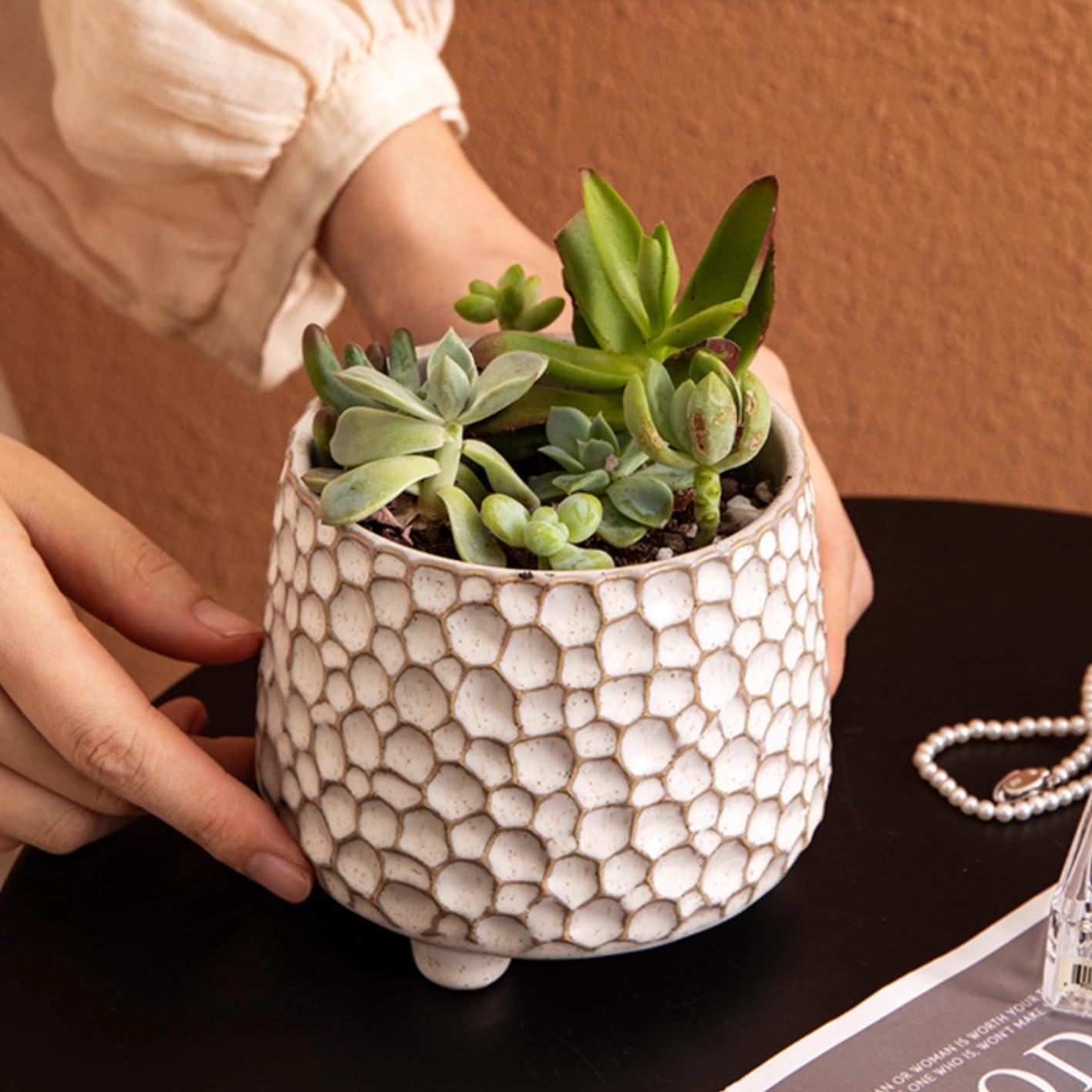 Alikexin ceramic utensil crock on countertop keeps tools neatly within reach.