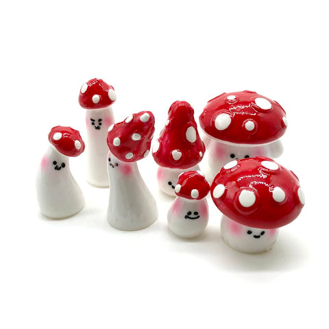 Aliotech 7pcs red mini mushrooms add bright fairy garden accents to your micro landscape.