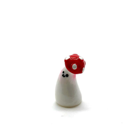Aliotech glossy resin mushrooms complement container gardens.