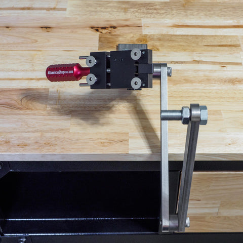 All American Sharpener 5005 Gen 2 blade sharpening on mower blades in use.