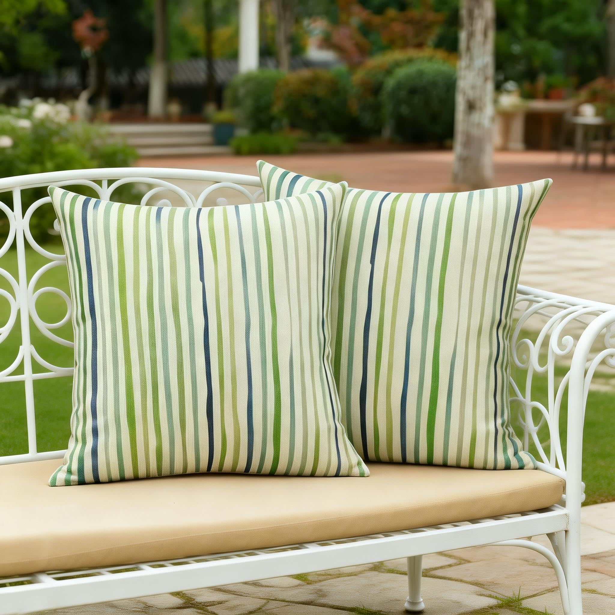All Smiles machine-washable outdoor pillow cover in sage for easy cleaning