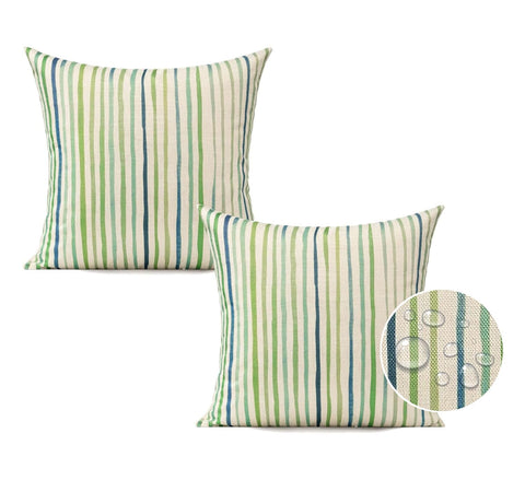 All Smiles sage-green striped cushion cover adds weather-ready style to outdoor spaces