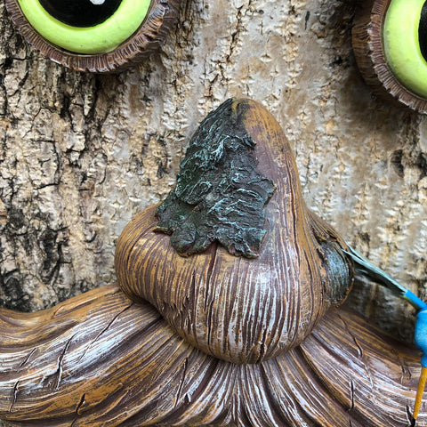 ALLADINBOX Tree Face Birdfeeder old-man-sculpture adds whimsy to your yard.