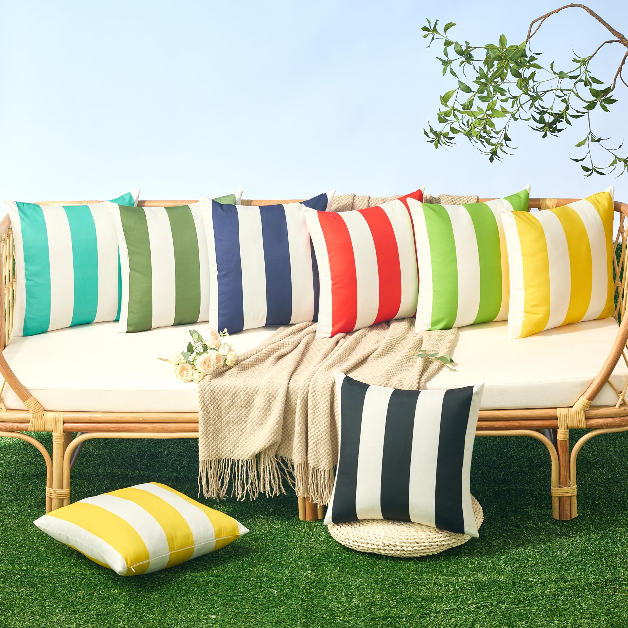 Allorry navy striped pillow cover on a patio setup, enhances outdoor decor.