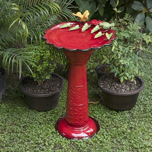 Alpine birdbath with birds and leaves detail for charming yard decor.