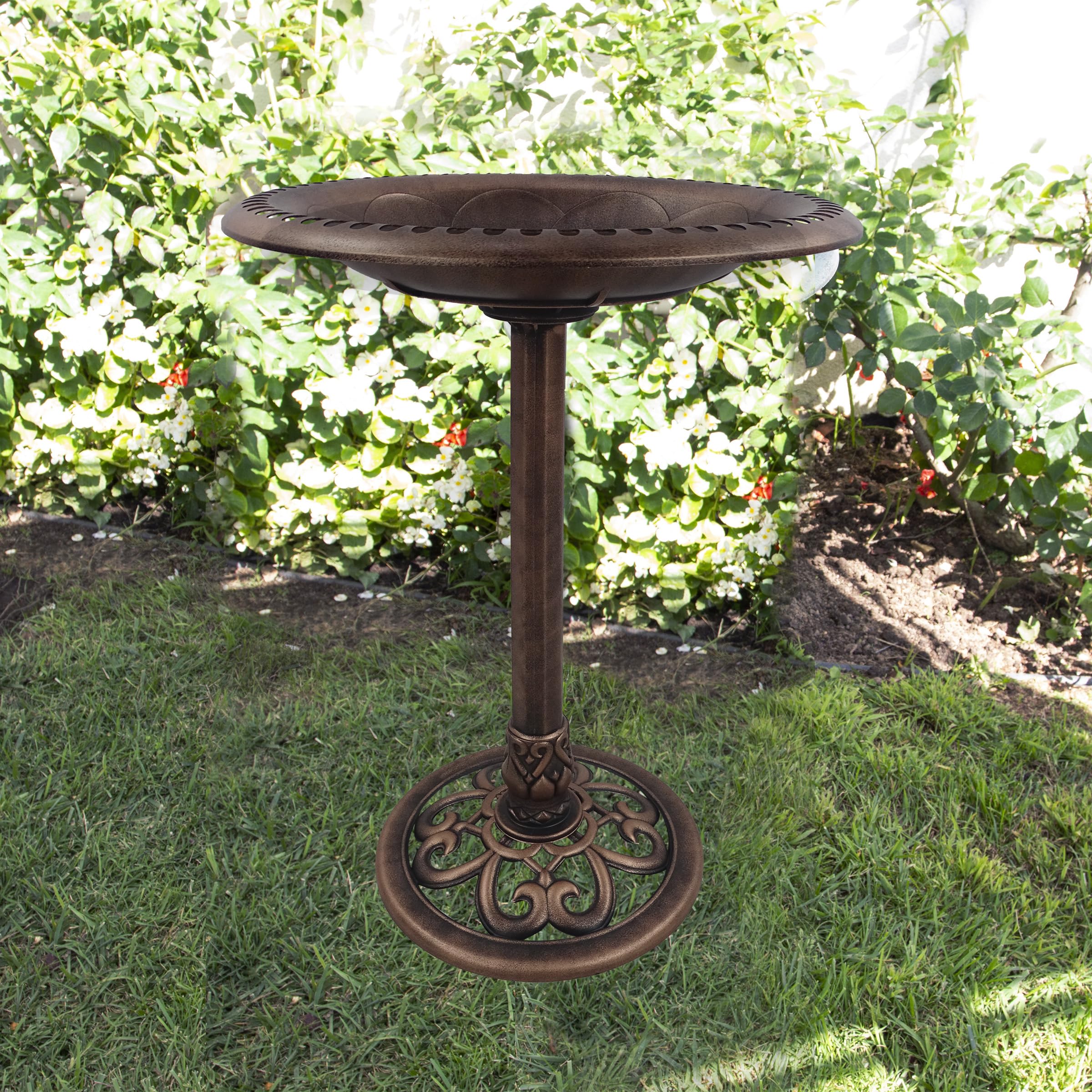 Metal ground stakes anchor the Alpine birdbath for stable outdoor display.
