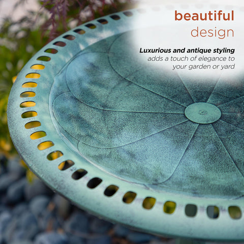 Birdbath pictured beside feeders for a welcoming wildlife scene.