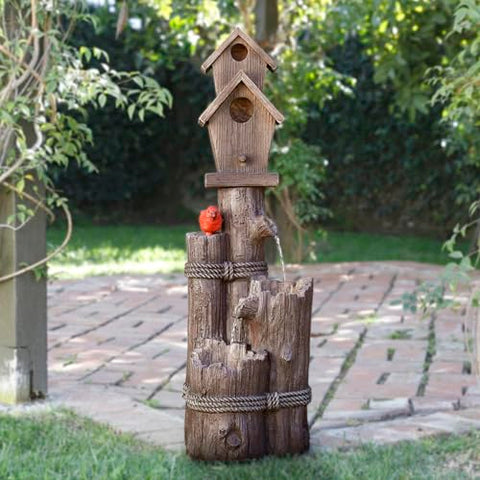 Alpine cardinal accent detail enhances garden focal point.