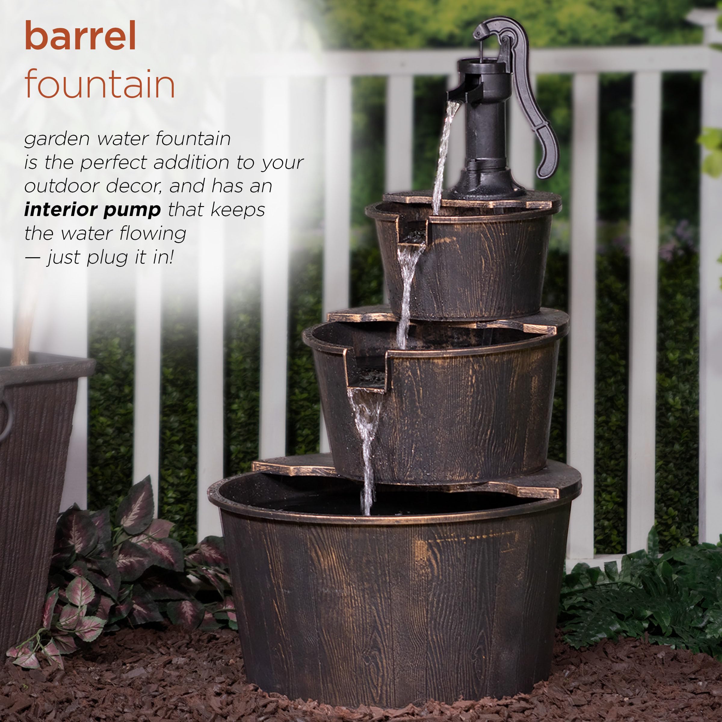 Three-barrel tiers seen from side showcasing waterfall flow in outdoor setting