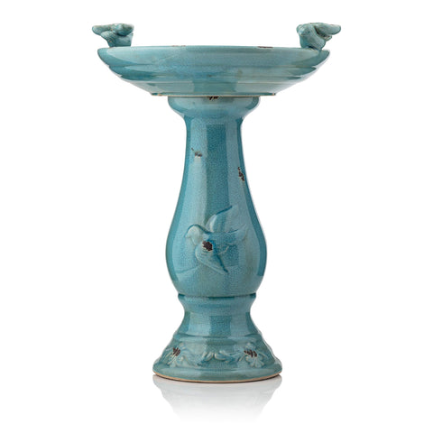 Alpine Corporation turquoise pedestal birdbath provides stable height for outdoor spaces