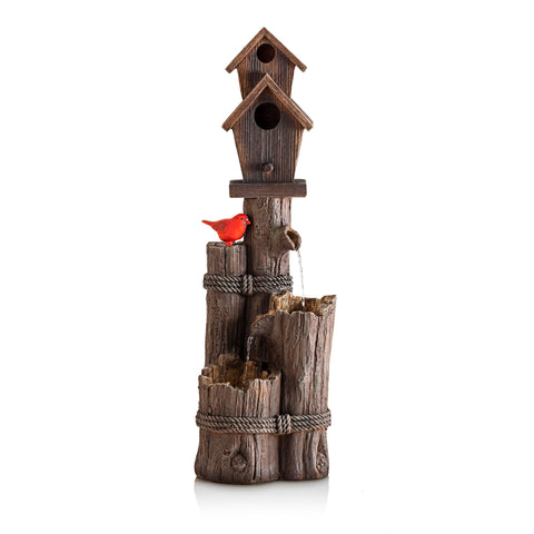 Alpine hollow birdhouse invites wildlife while decorating outdoors.