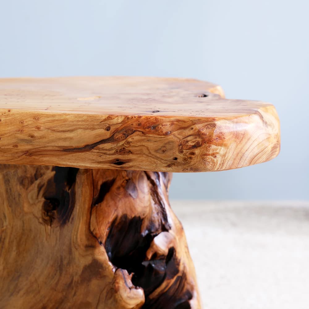 ALTERMATE cedar stump stool in a bedroom scene for compact seating.