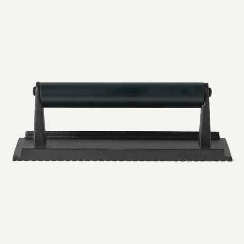 Amazon Basics burger press grooved bottom creates grill marks.