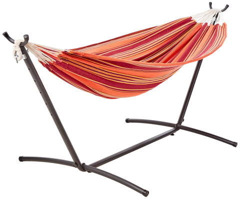 Amazon Basics double hammock with orange stripe setup for two in the backyard.