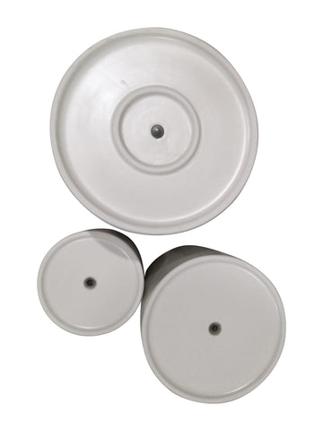 Amazon Basics drainage hole and rubber plug shown on ceramic planter 6-inch.