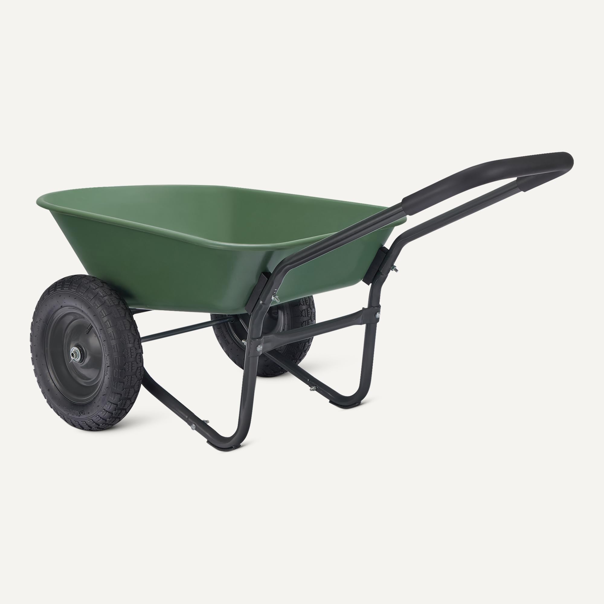 Amazon Basics garden wheelbarrow loading soil demonstrates easy lifting.