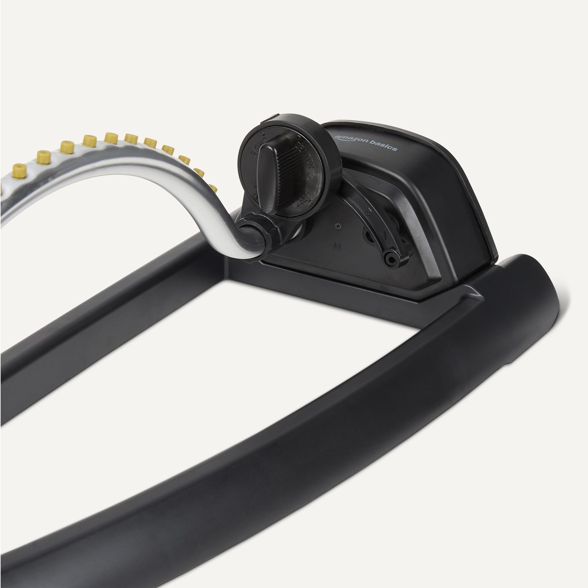 Amazon Basics spray nozzle array highlights even spray across the yard