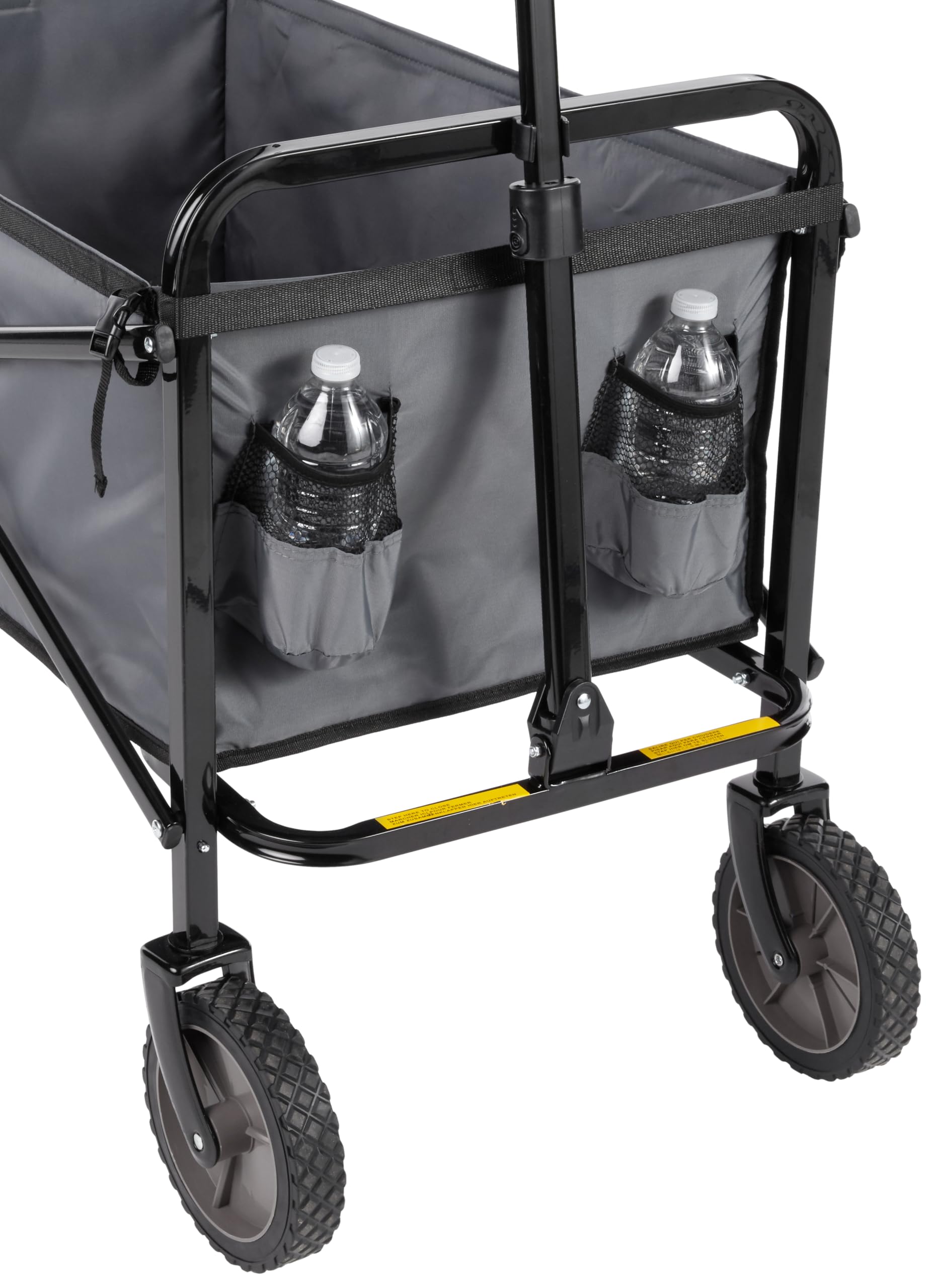 Amazon Basics wagon extendable-handle demonstrates smooth maneuverability on uneven terrain.