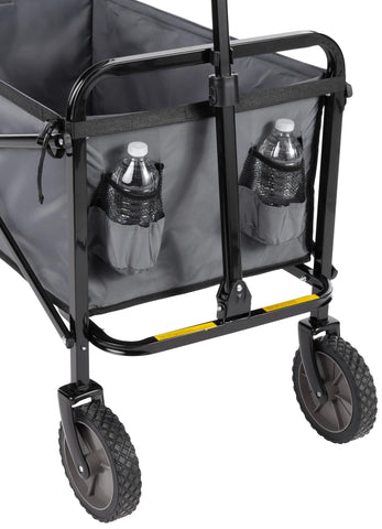 Amazon Basics wagon extendable-handle demonstrates smooth maneuverability on uneven terrain.