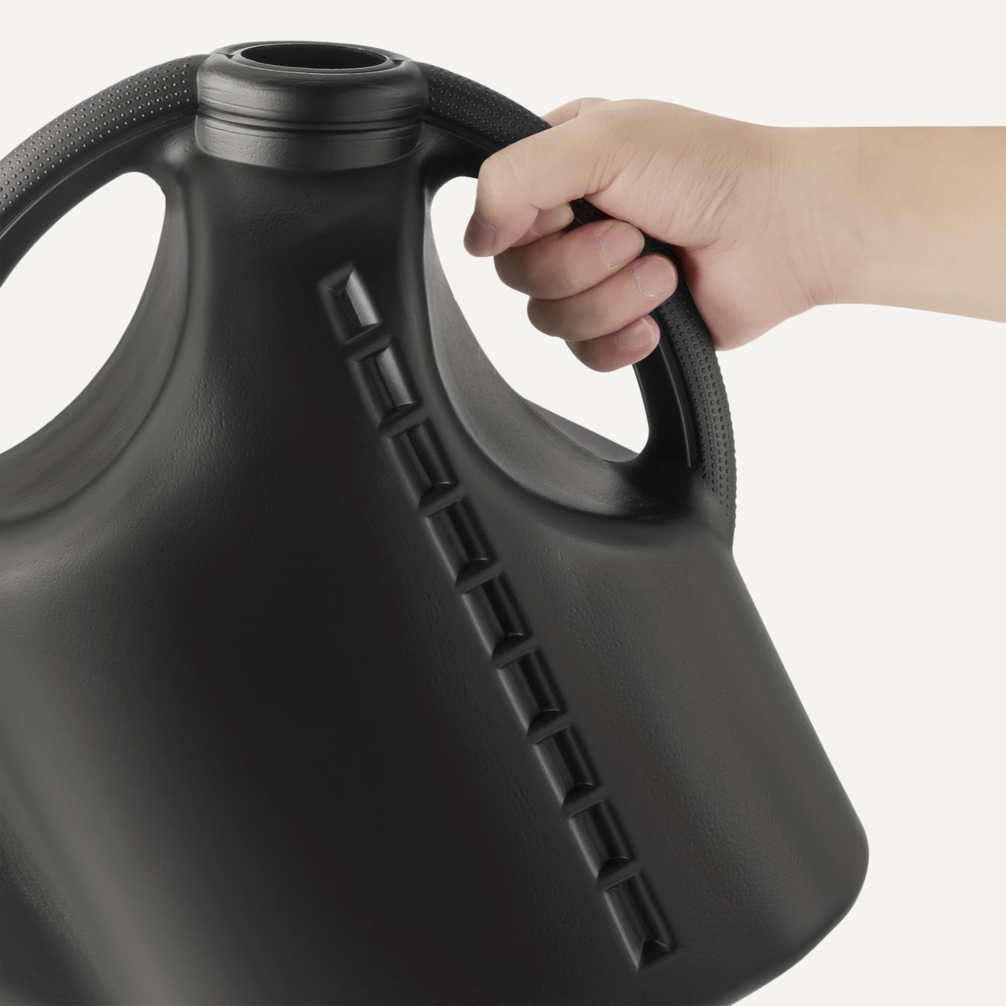 Amazon Basics watering can with large-opening for quick refills.